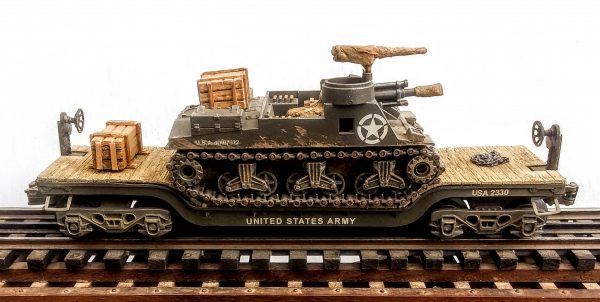 US Army M7B1 Priest 105mm Self-Propelled Howitzer on 35′ Drop Center Flat Car USA 2330(AV15.1-FC5.2USA)_Operates on 3-Rail “O”Gauge track • Available Today • (CTN 30)