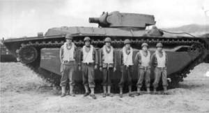 708th Amphibian Tank Bn. crew with their LVT(A)(4), equipped with the turret and 75mm howitzer of the M8 Howitzer Motor Carriage