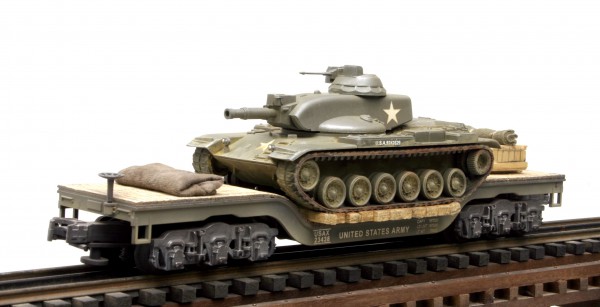 US Army M60A1E1 Tank, Vietnam, on 45′ Drop Ctr Flat Car USAX 23438(AV25-FC8.2USA)_Operates on 3-Rail “O”Gauge track • Available Today • (CTN 26)