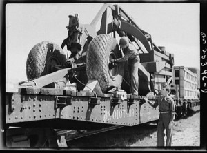 LeTourneau road scrapers on flat car being sent overseas, Holabird Ordnance Depot, Baltimore, MD, 1943
