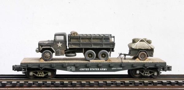 US Army M35A1 2.5 Ton Cargo Truck w/Cargo Load & Trailer Tow on 42′ Flat Car, Vietnam era USAX 23069(V16.2-FC3.2USA)_Operates on 3-Rail “O”Gauge track • Available Today • (CTN 1)