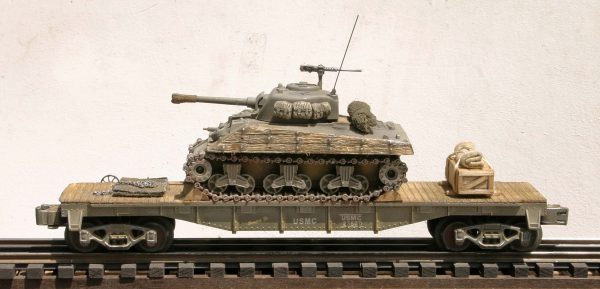 USMC Sherman M4A3 Tank w/Wood Side Armor on 40′ Flat Car USMC23430(AV3H-FC2.2USMC)_Operates on 3-Rail “O”Gauge track • Available Today • (CTN 25)