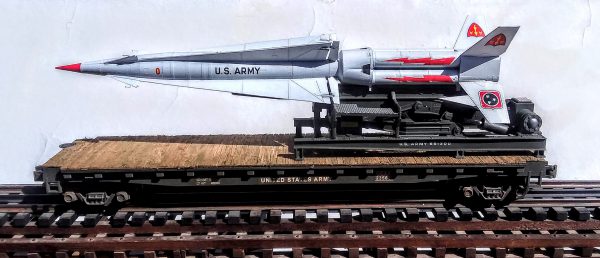 US Army Nike Hercules SAM Missile & Launcher(U.S. Army 651300) on 50′ Flat Car USAX23566(MR3-FC6.2 USA)_Operates on 3-Rail “O”Gauge track • Available Today • (CTN 33)