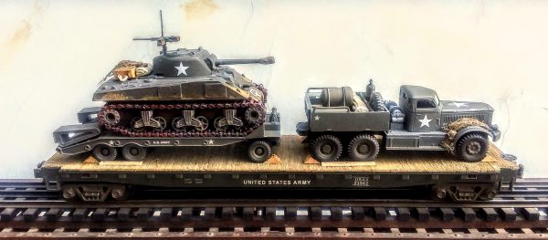 US Army M-20 Diamond T 12 Ton Prime Mover with M-9 Tank Transport & M4A3 Sherman Tank on 50′ Flat Car USAX 23562(V15.4-FC6.2USA)_Operates on 3-Rail “O”Gauge track  • Available Today • (CTN 33)