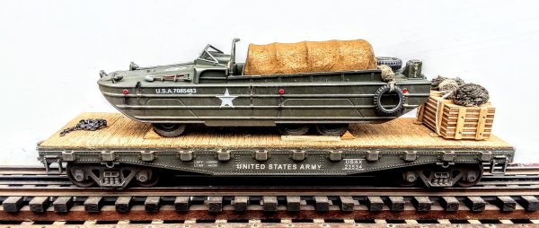 US Army GMC Amphibious DUKW w/Tarp Cargo Cover & Tire Bumpers on 42′ Flat Car USAX23534(BSA2.1-FC3.2USA)_Operates on 3-Rail “O”Gauge track  • Available Today • (CTN 38)