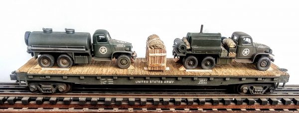 US Army GMC 6X6 Leroi Compressor Truck & GMC 6X6 Water Container Truck on 50′ Flat Car USAX 23544(MV1EF-FC6.2USA)_Operates on 3-Rail “O”Gauge track  • Available Today • (CTN 29)