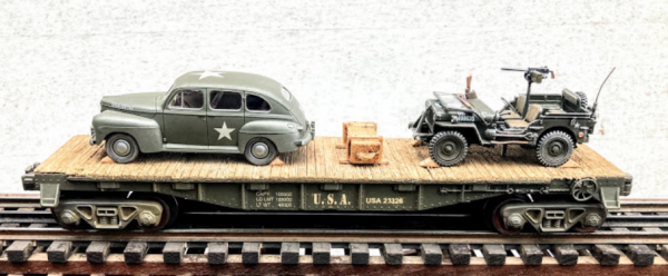 US Army_Ford Staff Car & Willy’s Jeep on 40′ Flat Car w/ Supply Crate_USAX 23326(MV4AE-FC2.2USA)_Operates on 3-Rail “O”Gauge Track • Available Today • (CTN 23)